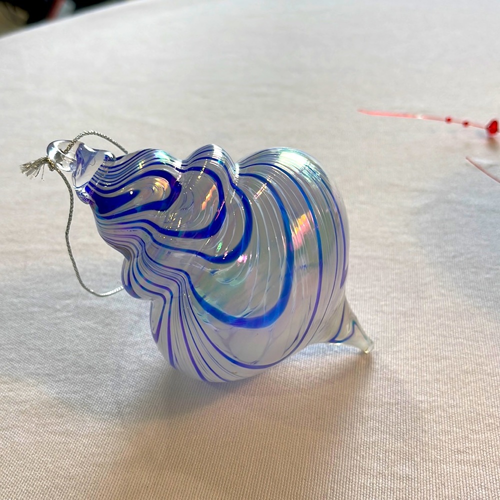 Stunning blue and white swirl glass ornament… Top style… a pearlized beauty